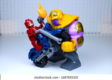 DETROIT, USA - MAR 30, 2020: Lego Dare Devil Attacks Thanos On His Bike.