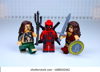 DETROIT, USA - MAR 30, 2020: Lego Deadpool with Aqua man and Wonder woman.
