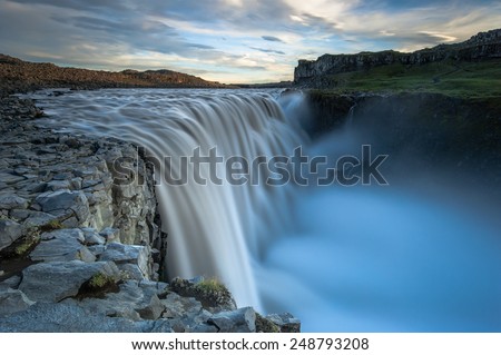 Dettifoss. Situated in Vatnajokull N.P. in Northeast Iceland, it's the most powerful waterfall in Europe. Photo taken from the east bank at sunset.