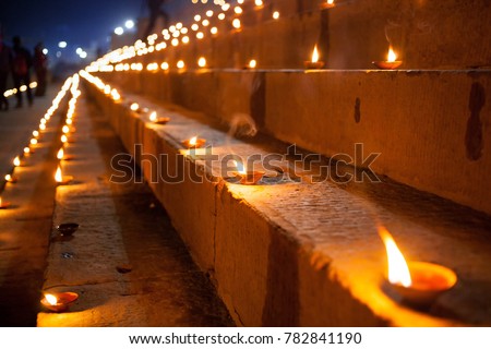 Dev Deepawali festival, Earthen lamps lit on the stairs leading to the Ganges, Varanasi, Uttar Pradesh, India.