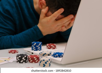 Devastated Gambler Man Losing A Lot Of Money Playing Poker In Casino, Gambling Addiction. Divorce, Loss, Ruin, Debt, Ludopata Concept.