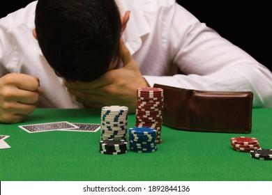 Devastated Gambler Man Losing A Lot Of Money Playing Poker In Casino, Gambling Addiction. Divorce, Loss, Ruin, Debt, Ludopata Concept