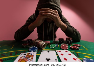 Devastated Gambler Man Losing A Lot Of Money Playing Poker In Casino, Gambling Addiction. Divorce, Loss, Ruin, Debt, Ludopata Concept.