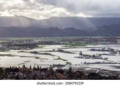 Devastating Flood Natural Disaster in the city and farmland after storm. Abbotsford, Greater Vancouver, British Columbia, Canada