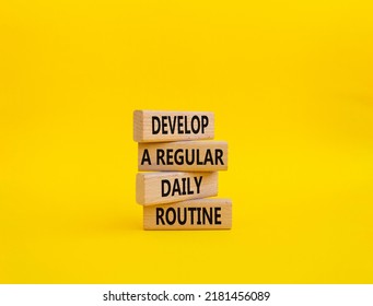 Develop a regular daily routine symbol. Concept words Develop a regular daily routine on wooden blocks. Beautiful yellow background. Business and Develop a regular daily routineconcept. Copy space.