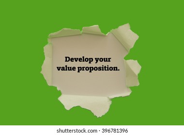 "Develop your value proposition" slogan written under torn paper.