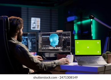 Developer being asked existential questions by awaken AI gaining consciousness, isolated screen device. Man communicating with artificial intelligence emulating humans, chroma key notebook