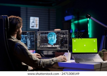 Developer being asked existential questions by awaken AI gaining consciousness, isolated screen device. Man communicating with artificial intelligence emulating humans, chroma key notebook