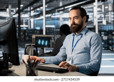 Developer in data center office doing software updates, verifying neural network parameters. Server farm employee using PC to inspect configurations, ensuring optimal application performance