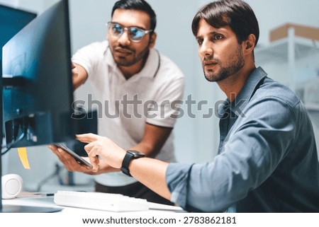 Developer expertise programming IT technology career. Adult engineer man indian latin teamwork programmer coding AI artificial intelligence algorithm coder training monitor. Data software development