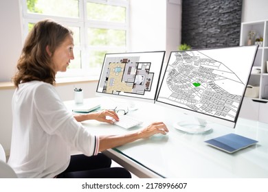 Developer Looking At Land Plot Map And Cadastre Plan