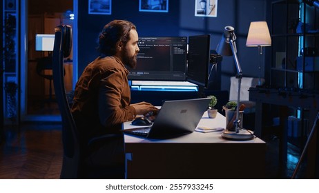 Developer pressed by deadline, drinking coffee and doing multitasking to finish developing PC code. Caffeinated IT specialist solving database error using multiple desktop and laptop screens, camera B