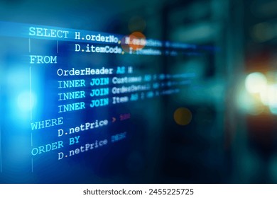 Developer or Programmer's text editor showing SQL Structured Query Language code on computer monitor and server room background. SQL Programming language concept, Computer courses, Training, Learnin.