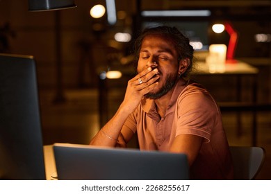 Developer tired of his late work - Shutterstock ID 2268255617