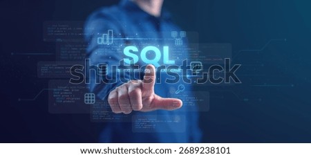 A developer touching a digital SQL interface representing Structured Query Language and database management technology. Ideal for coding, IT, and data analytics concepts.
