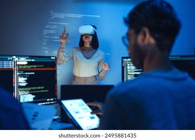 developer uses a VR headset to interact with projected interface designs, while colleagues discuss and code on screens, highlighting the integration of virtual reality and UIUX design
