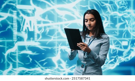 Developer using tablet to implement artificial intelligence parallel processing, breaking up complex computational tasks enabling AI systems to process more input data faster, camera A