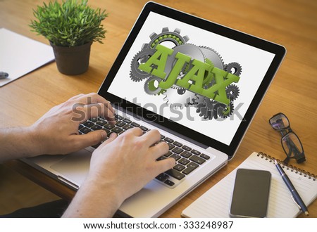Developer or web designer at work. Close-up top view of man working on laptop with ajax on screen. all screen graphics are made up.