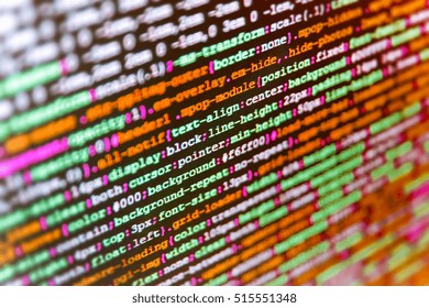 Developer working on websites codes in office. Internet security hacker prevention. Monitor closeup of function source code. Server logs analysis. Mobile app developer. Binary digits code editing. 
