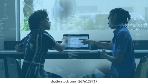 Developers collaborating on laptop typing code in meeting room, with glass reflections. Collaboration, innovation, teamwork, modern, technology, office, brainstorming - Powered by Shutterstock - Get 15% off with code: PIKWIZARD15