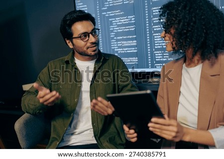 developers debug and refine together, team collaboratively analyzing and improving software code