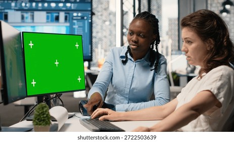 Developers team planning construction with software tools and green screen, reviewing project layouts, zoning requirements and property development strategies for real estate growth.