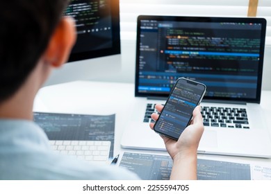 Developing programmer Development Website design and coding technologies working at home - Shutterstock ID 2255594705