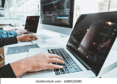 Developing programmer Team Development Website design and coding technologies working in software company office - Shutterstock ID 1688525080