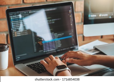 Developing programmer team reading computer codes Development Website design and coding technologies - Shutterstock ID 1716854038
