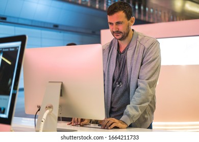 Developing programming and coding technologies. Website design. Programmer working in a software develop in company office.