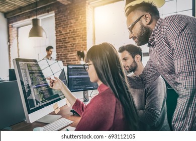 Developing programming and coding technologies. Website design. Programmer working in a software develop company office. - Shutterstock ID 693112105