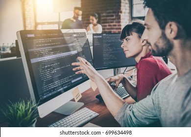 Developing programming and coding technologies. Website design. Programmer working in a software develop company office. - Shutterstock ID 699634498