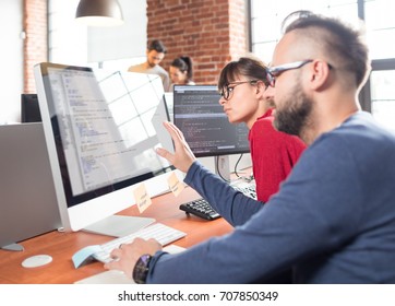 Developing programming and coding technologies. Website design. Programmer working in a software develop company office. - Shutterstock ID 707850349
