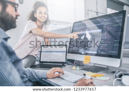 Developing programming and coding technologies. Website design. Programmer working in a software develop company office.