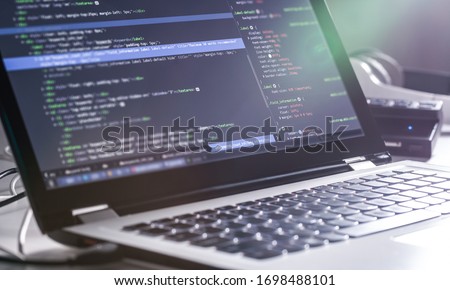 Developing programming and coding technologies. Website design. Programmer working in a software develop company office.