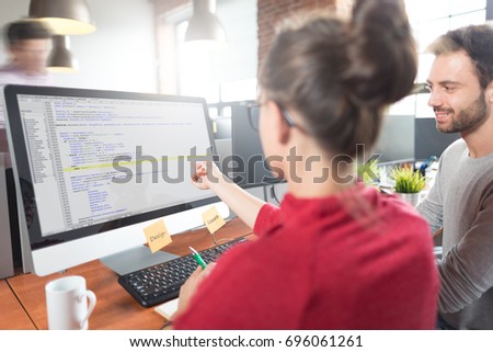 Developing programming and coding technologies. Website design. Programmer working in a software develop company office.