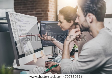 Developing programming and coding technologies. Website design. Programmer working in a software develop company office.