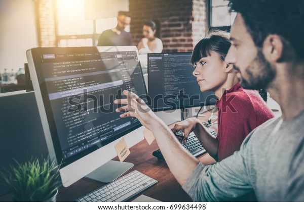 Developing\
programming and coding technologies. Website design. Programmer\
working in a software develop company\
office.