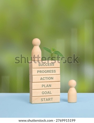 Development business growth processes are staged of wooden men, wooden blocks with words start, vision, goal, plan, action and green seedling. Success achievement concept