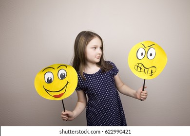 Development Of Emotional Intelligence. The Girl Plays With Smiles, Builds Erysipelas. Laughter, Fun, Anger. Teaching A Child.