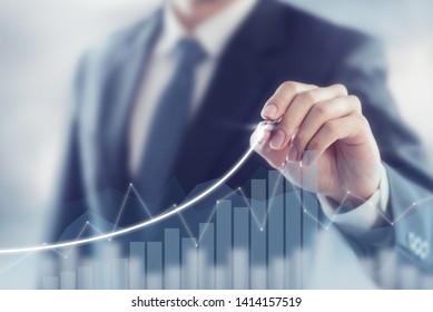 Development and growth concept. Businessman plan growth and increase of positive indicators in his business. - Shutterstock ID 1414157519