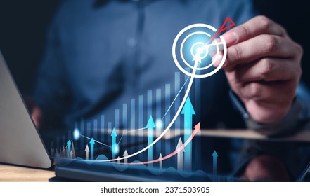 development, growth, plan, progress, success, target, financial, goal, investment, management. one hand typing keyboard another drawing indicator to check growth of performance for hit the goal.