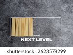 Development, Improvement. Completing a ask and moving forward to the next level. Next level loading bar on the table