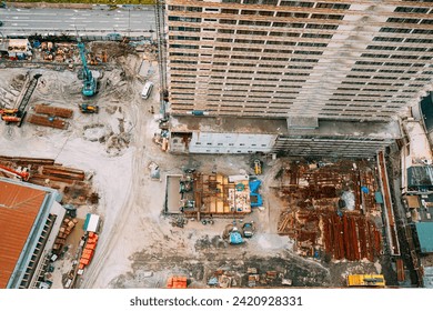 Development Multistorey Residential Building construction area. development on construction site. flat view Construction And bulding industry concept.