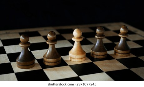 Deviant behavior. Unique, different from the crowd. White pawn among black pawns