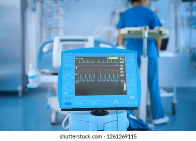 Device With The ECG Monitor In The Hospital Ward During The Work Of The Staff