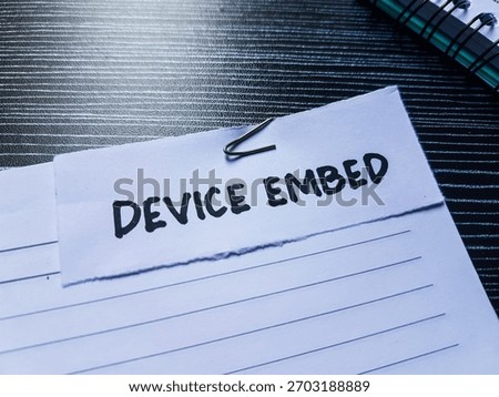 Device embed writting on table background.
