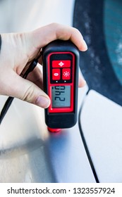 a device for measuring the paint layer