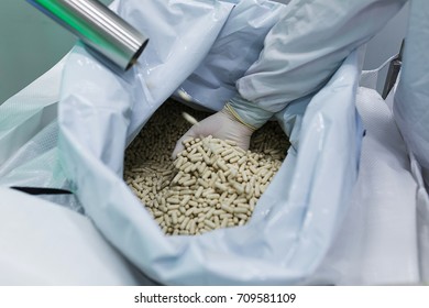 The Device For The Production And Packaging Of Medical Tablets In The Process Of Manufacturing And Sorting Tablets. Medicine And Health. Manufacture Of Medical Preparations.