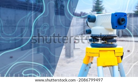 Device for surveyor. Optical theodelite on tripod. Equipment for creating topographic maps. Electronic theodel for surveyor. Topographic map in background. Place for text about geodesy.